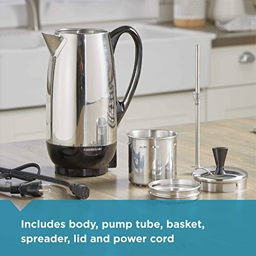 Coffee percolator set with components including body, pump tube, basket, spreader, lid, and power cord on a kitchen counter.