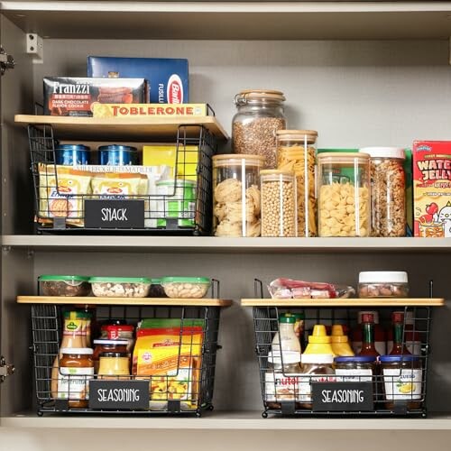 Organized pantry shelves with snacks and seasonings in baskets and jars.